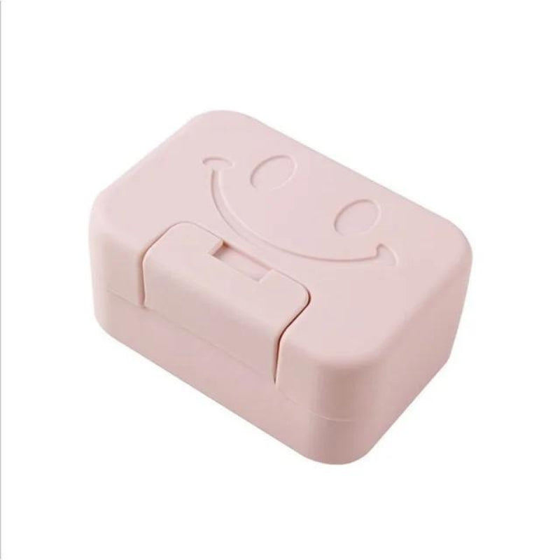 Boîte à savon compacte tenue en main