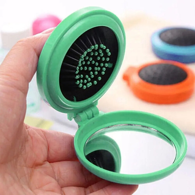 Miroir intégré de la brosse à cheveux de poche