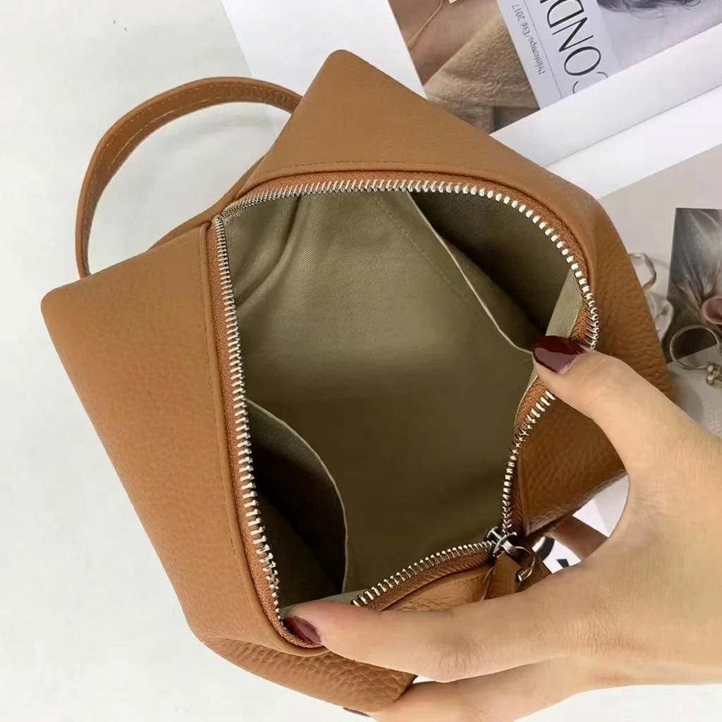 Fermeture éclair de la trousse de toilette en cuir