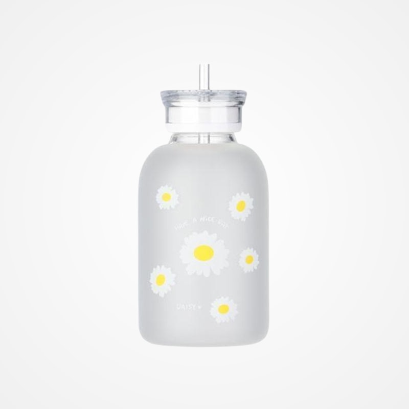 Gourde en verre avec paille et motif fleuri