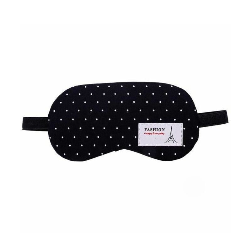 Masque de sommeil de voyage à motifs posé à plat