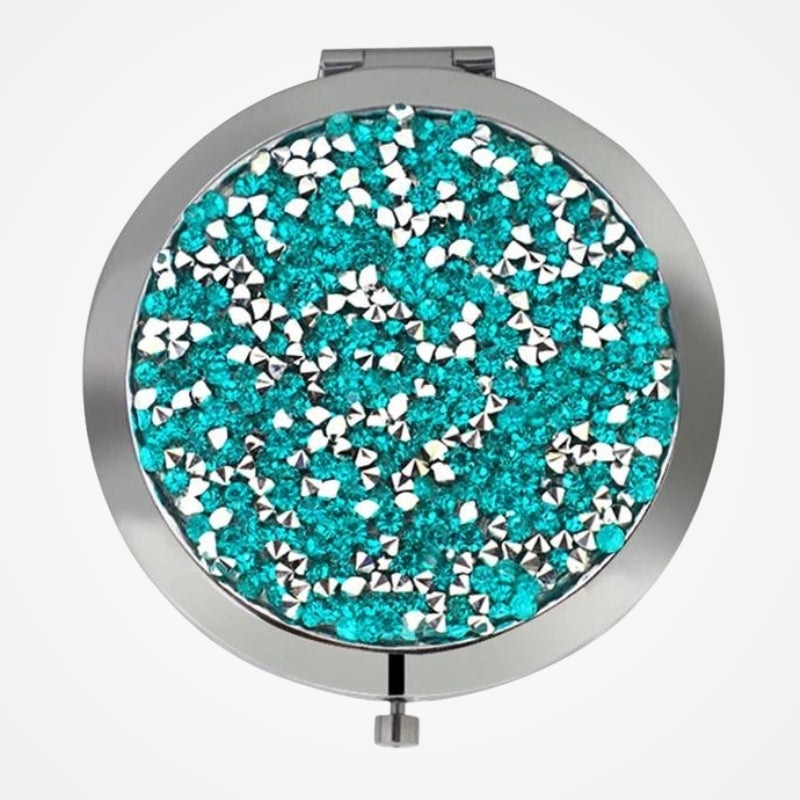 Miroir de poche ouvert montrant la surface réfléchissante