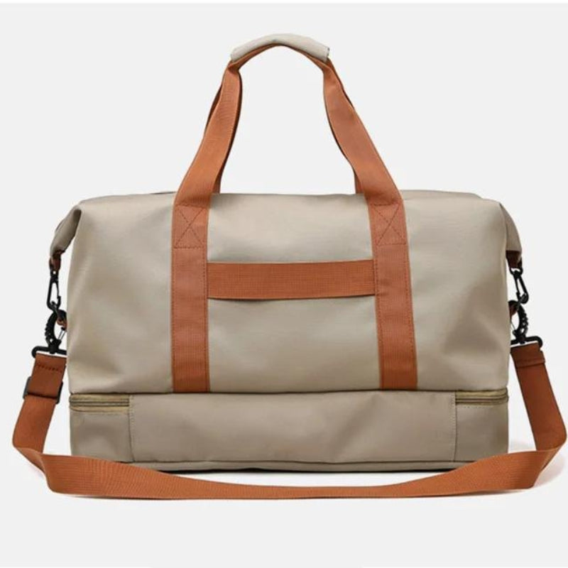 Compartiment à chaussures latéral ouvert du sac de voyage