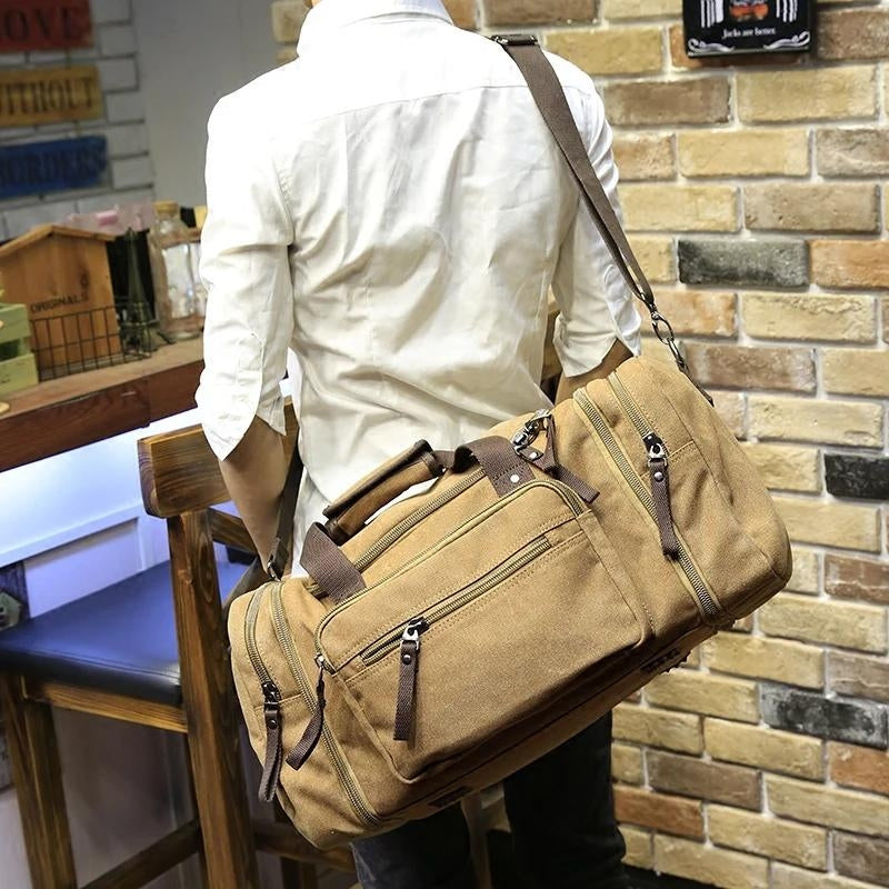 Sac de voyage en toile porté à l'épaule