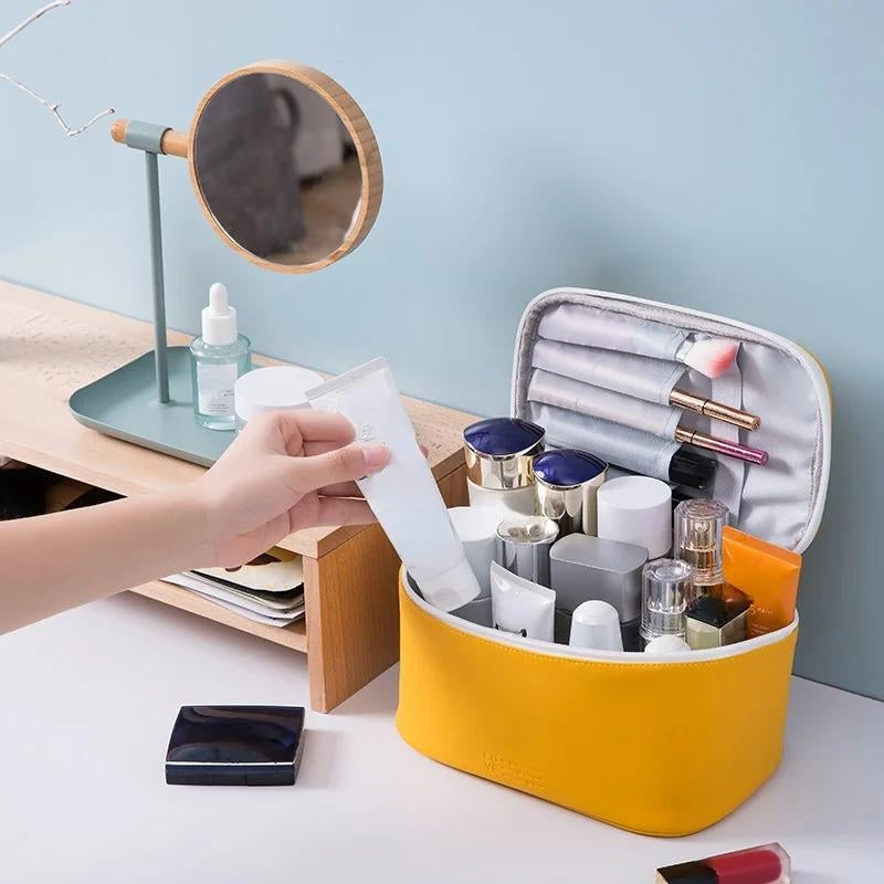 Rangement intérieur de la trousse de toilette