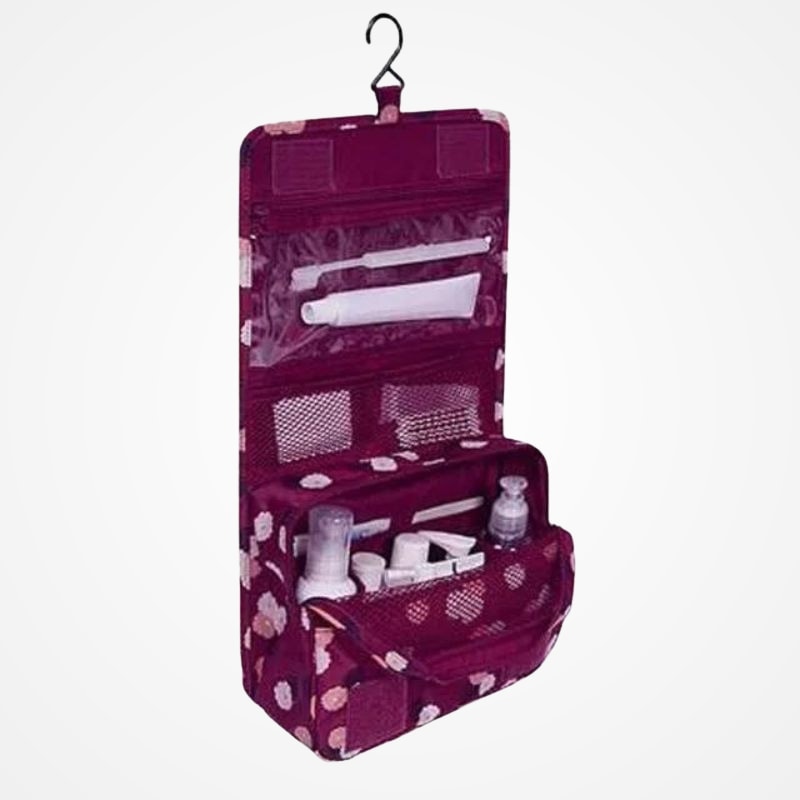 Trousse de toilette compacte tenue en main