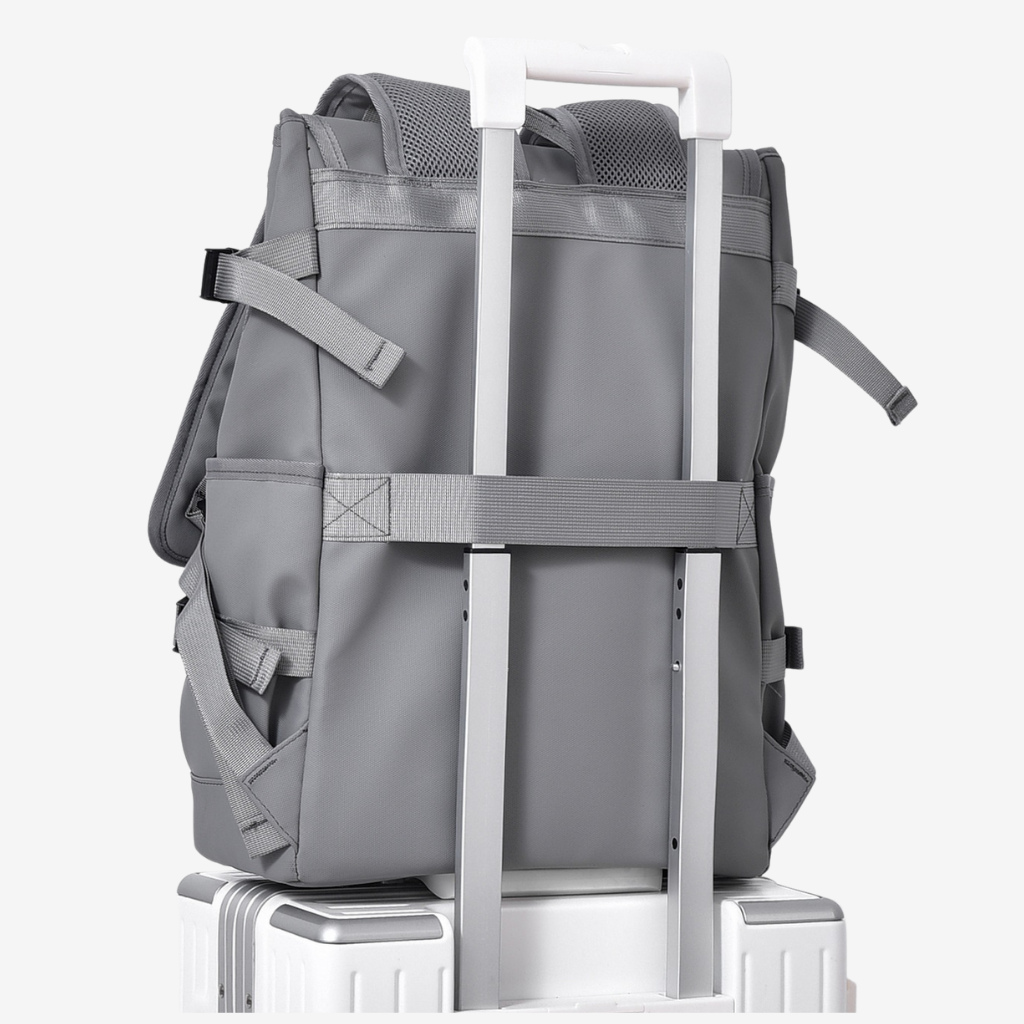 Sac de voyage compact glissé sous un siège d'avion