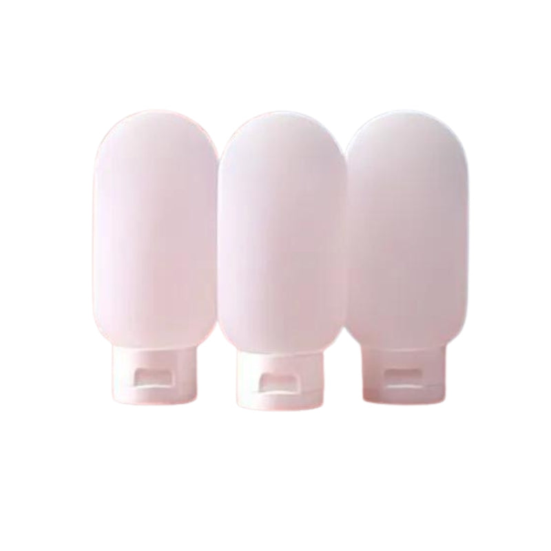Flacons de voyage en teintes claires