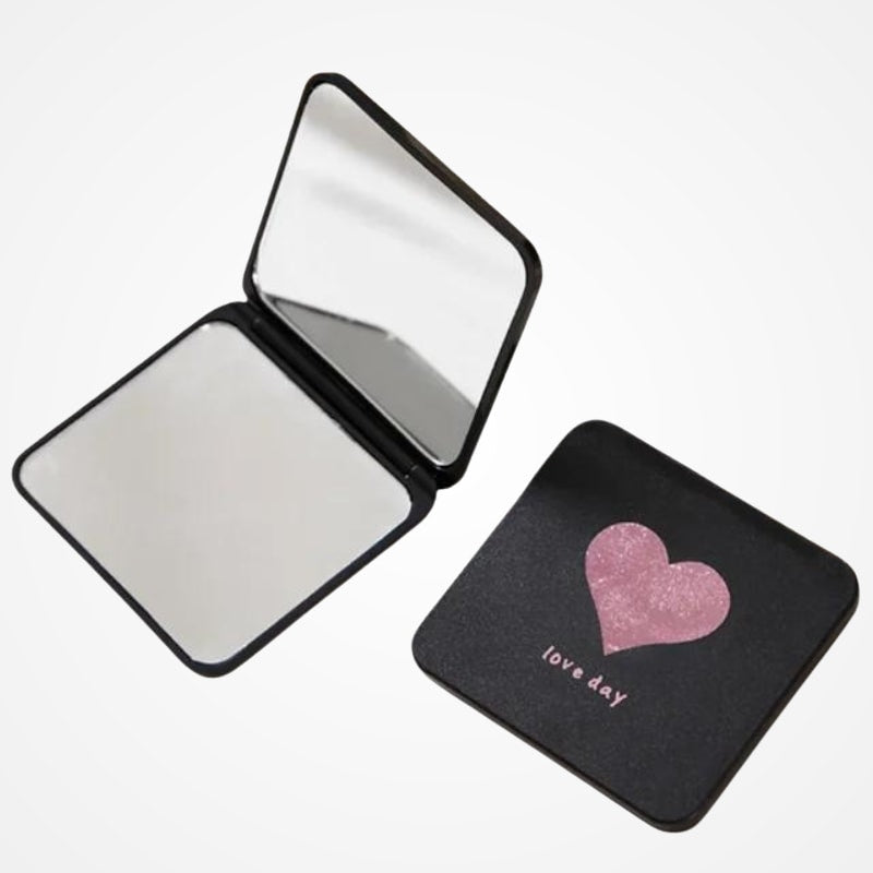 Miroir de poche noir à motif cœur