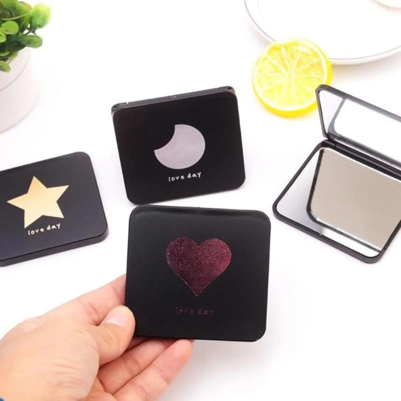 Miroir de poche ouvert montrant la surface réfléchissante