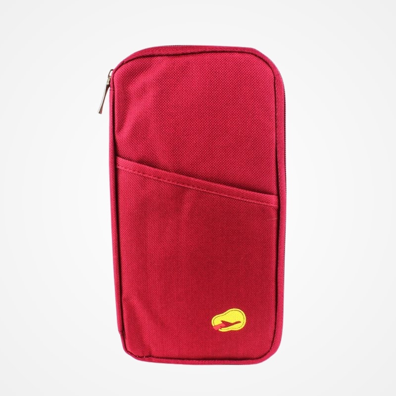 Pochette de voyage ouverte avec compartiments pour cartes et billets
