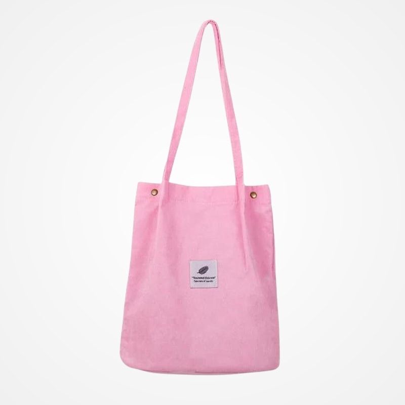 Détail des anses du tote bag de voyage