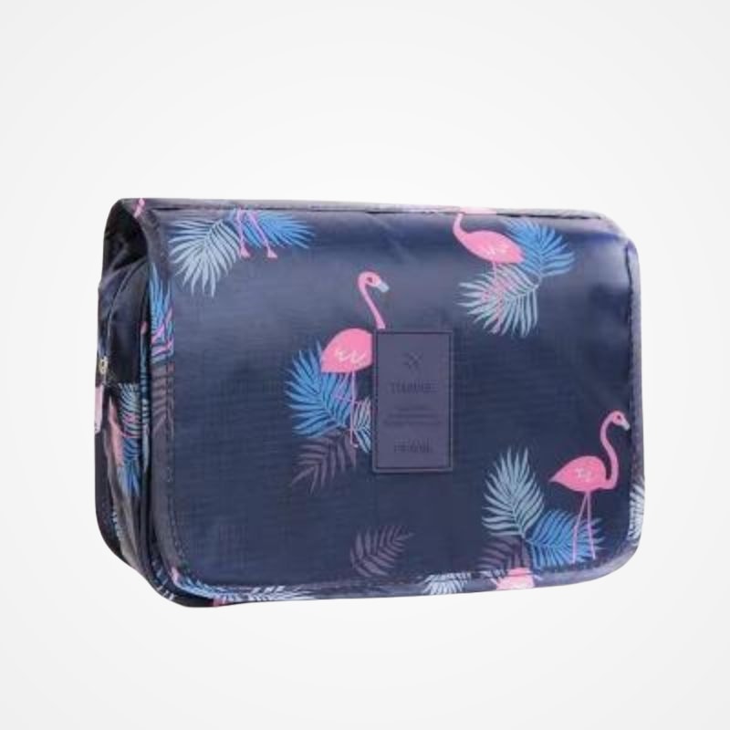 Trousse de toilette femme à motifs colorés posée sur une table